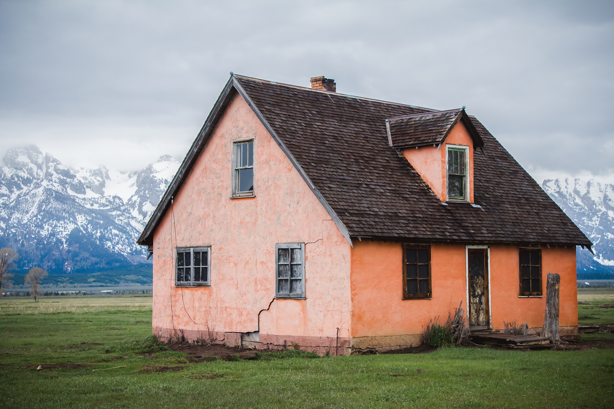 Grand Teton with pink abandoned home