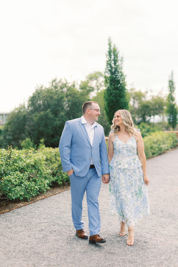 couple walking in a garden