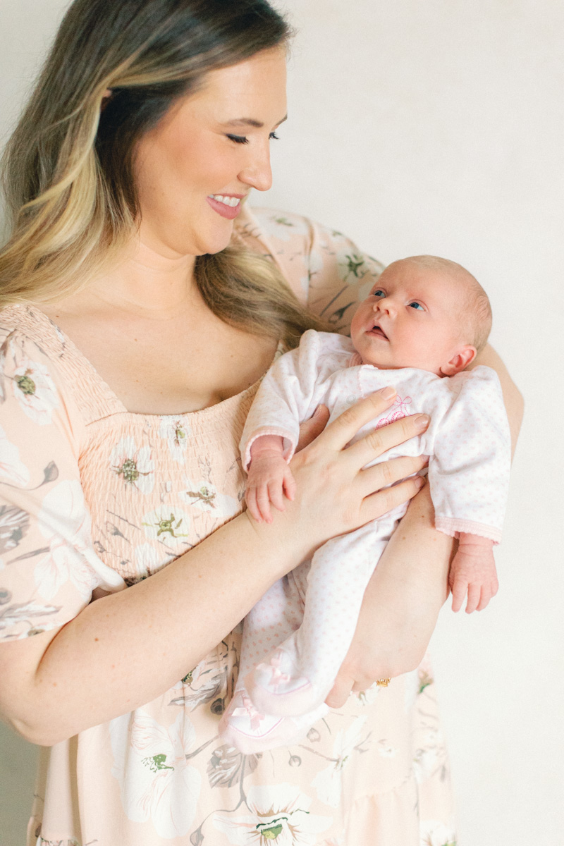 mom holding newborn baby