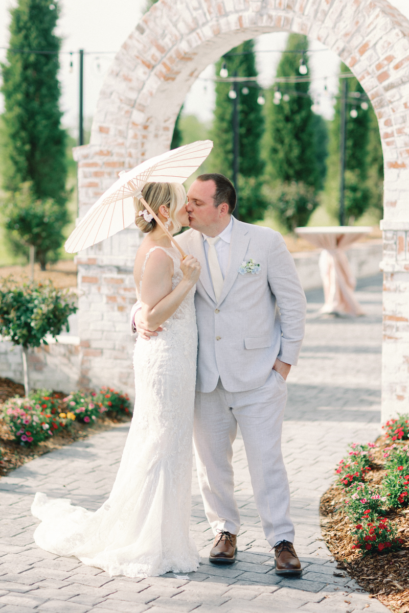 bride and groom kissing