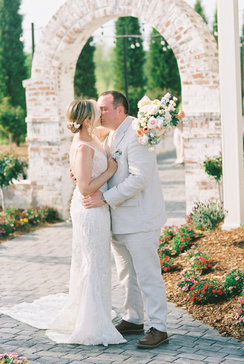 bride and groom kissing