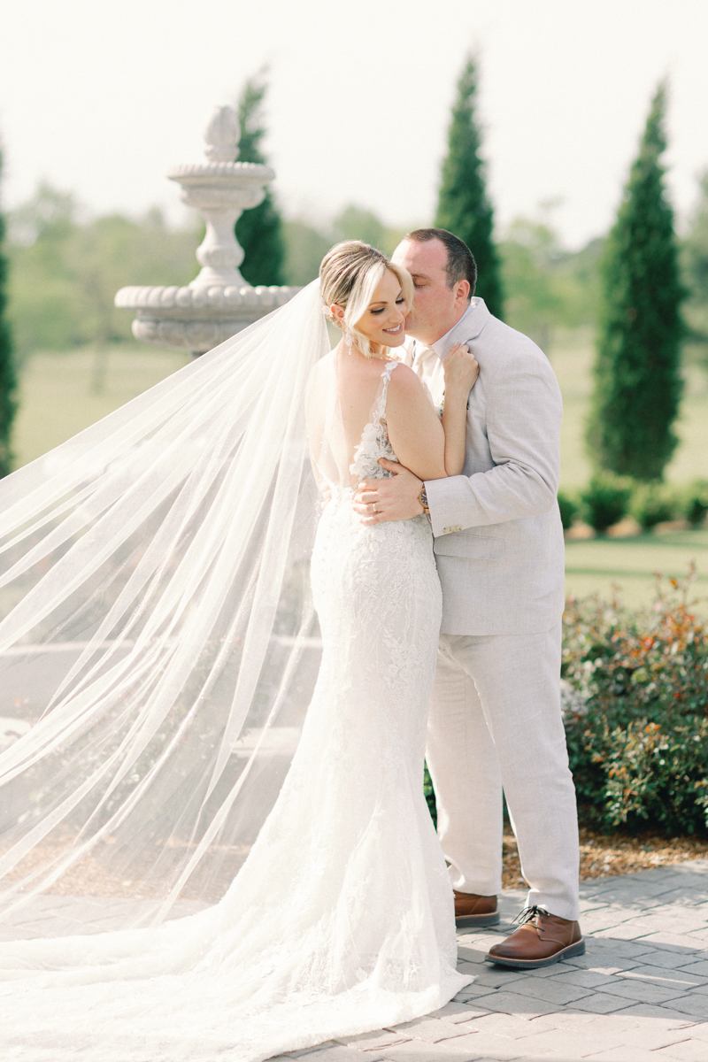 bride and groom kissing