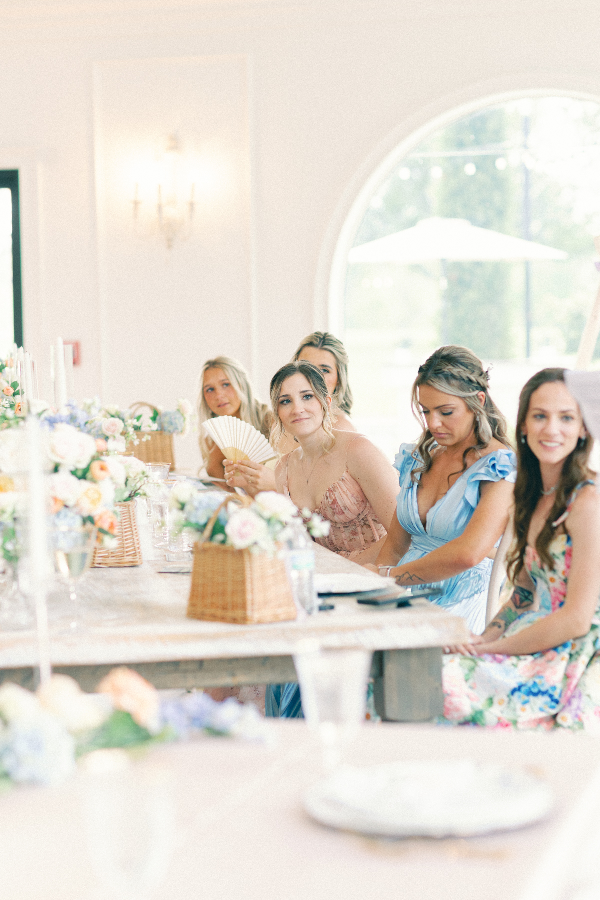 bridesmaid looking at the speeches