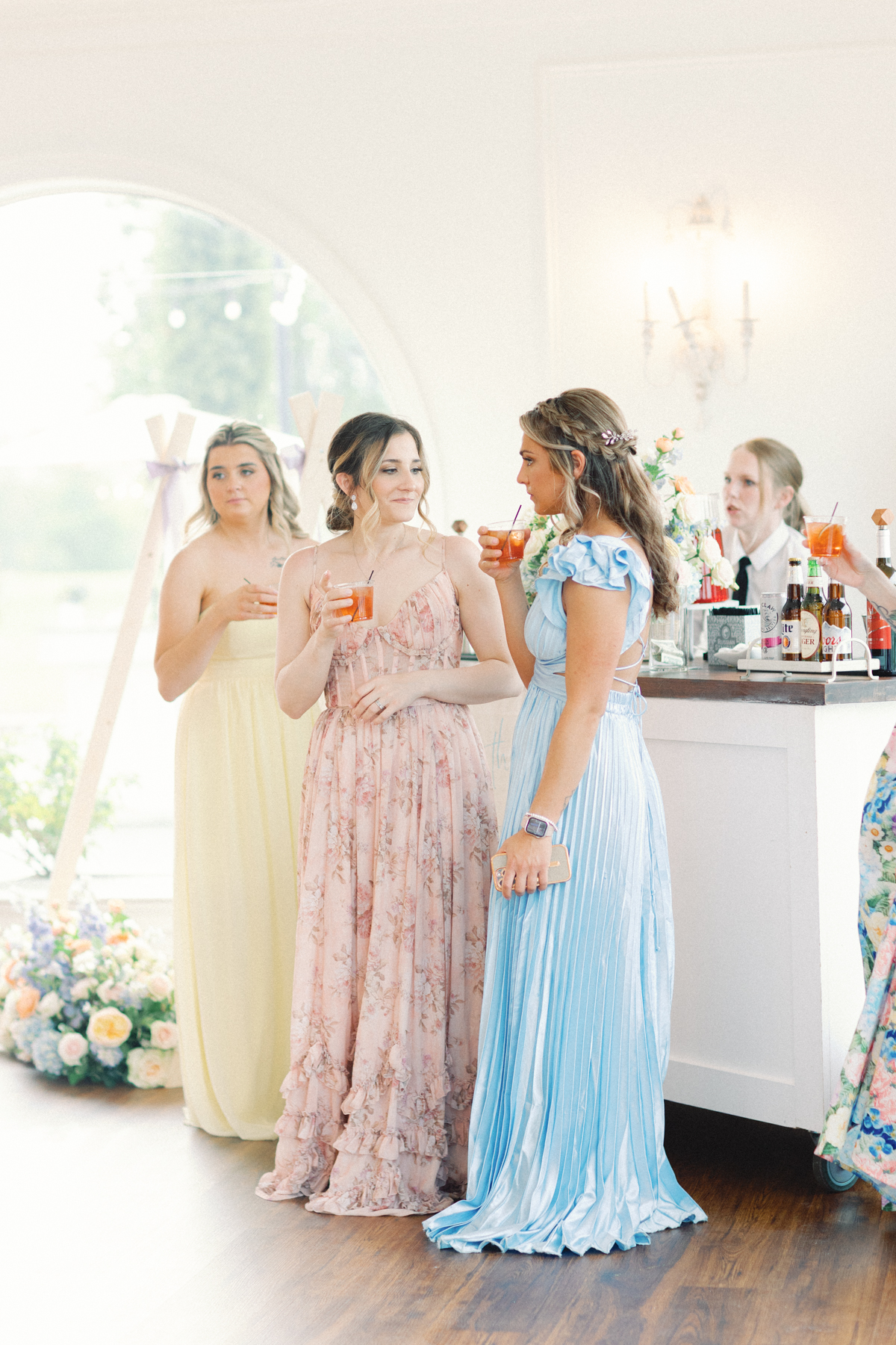 bridesmaids at the bar