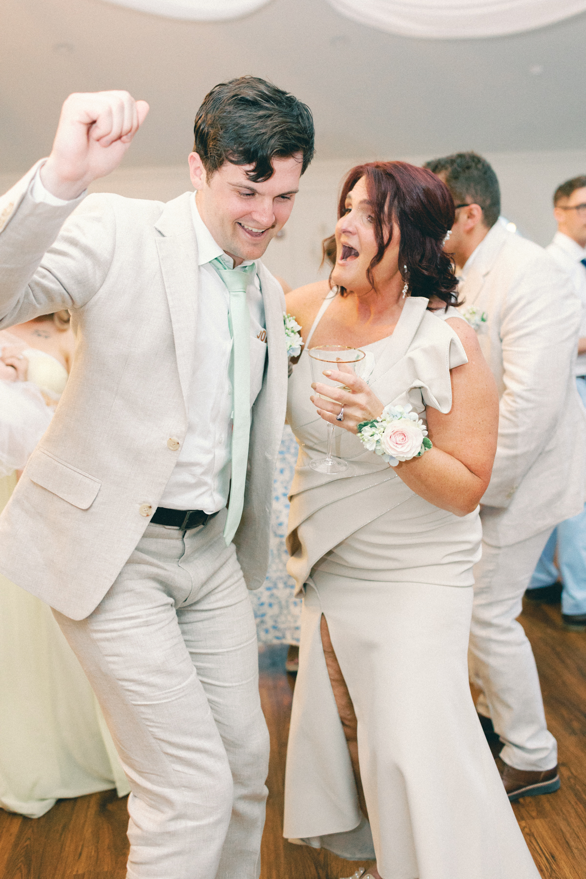 mom and son dancing together