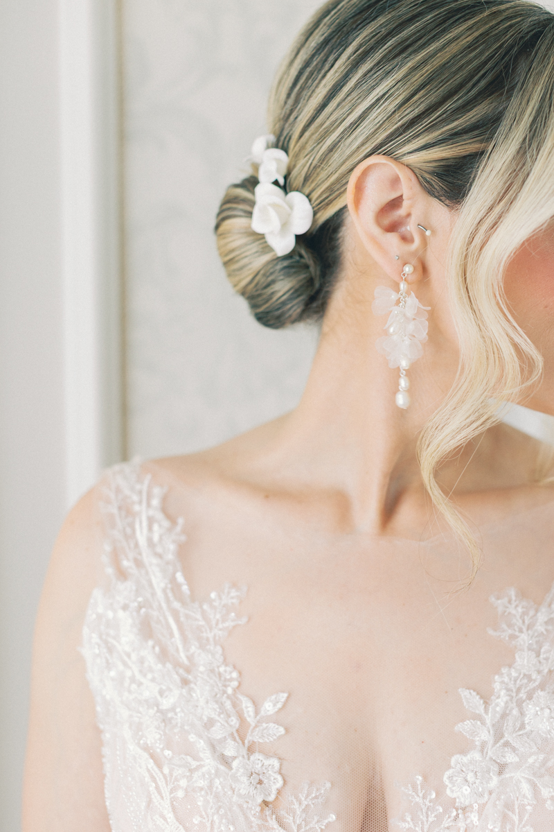 bridal portrait of earrings