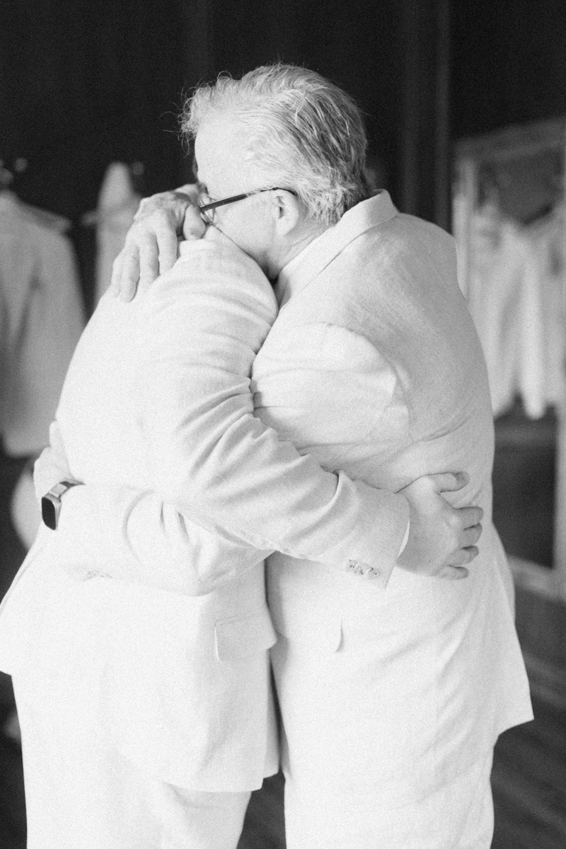 dad and son hugging