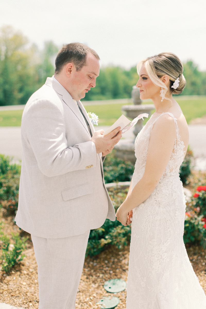 groom and bride exchanging vows