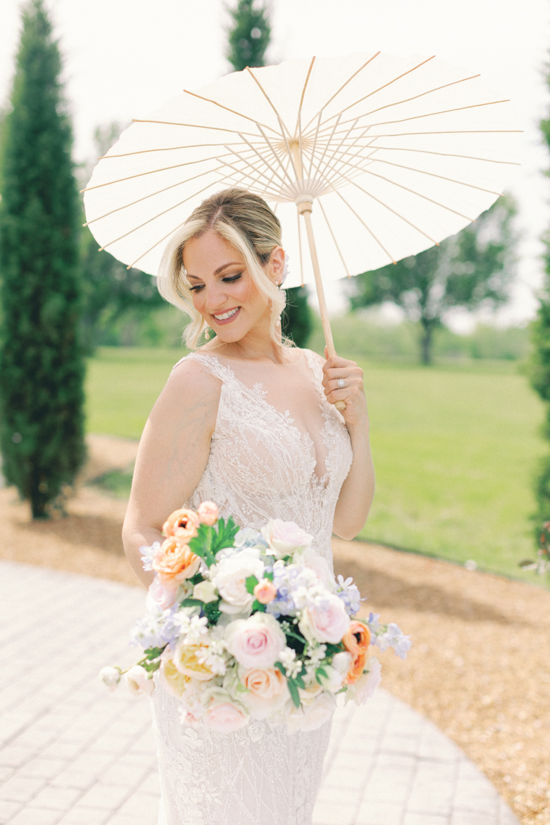 bride holding parasol