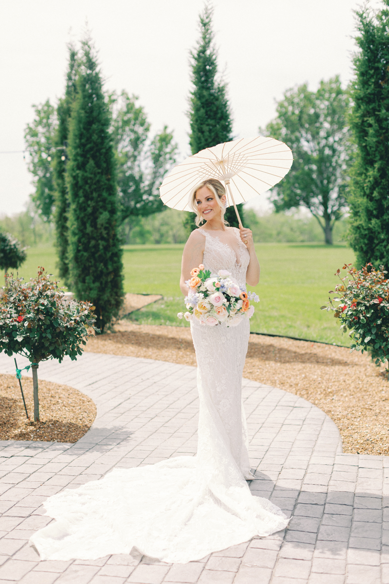 bride holding parasol