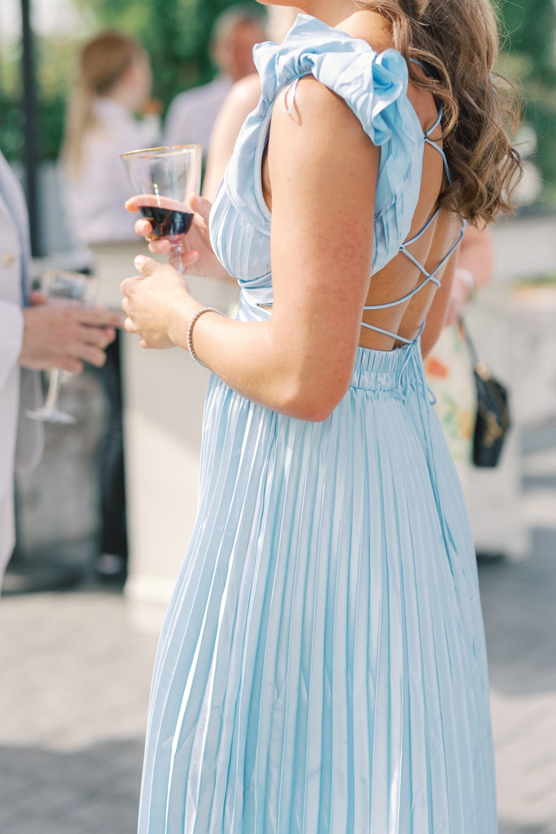 bridesmaid holding drink