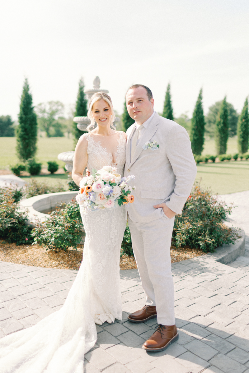 bride and groom smiling