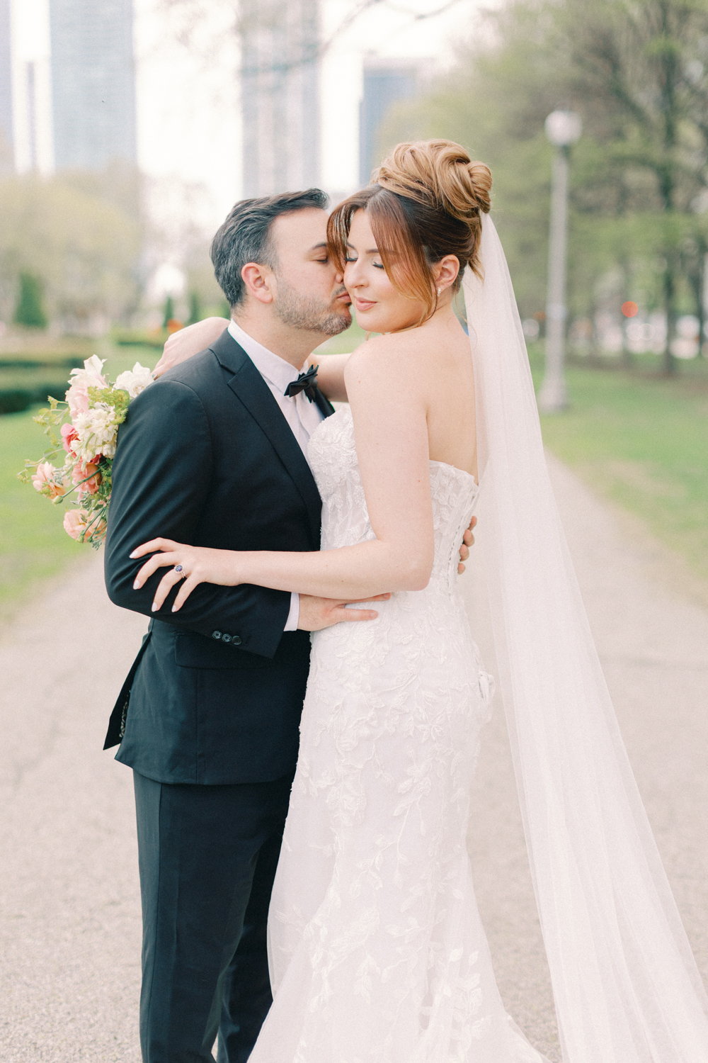 bride and groom cuddling