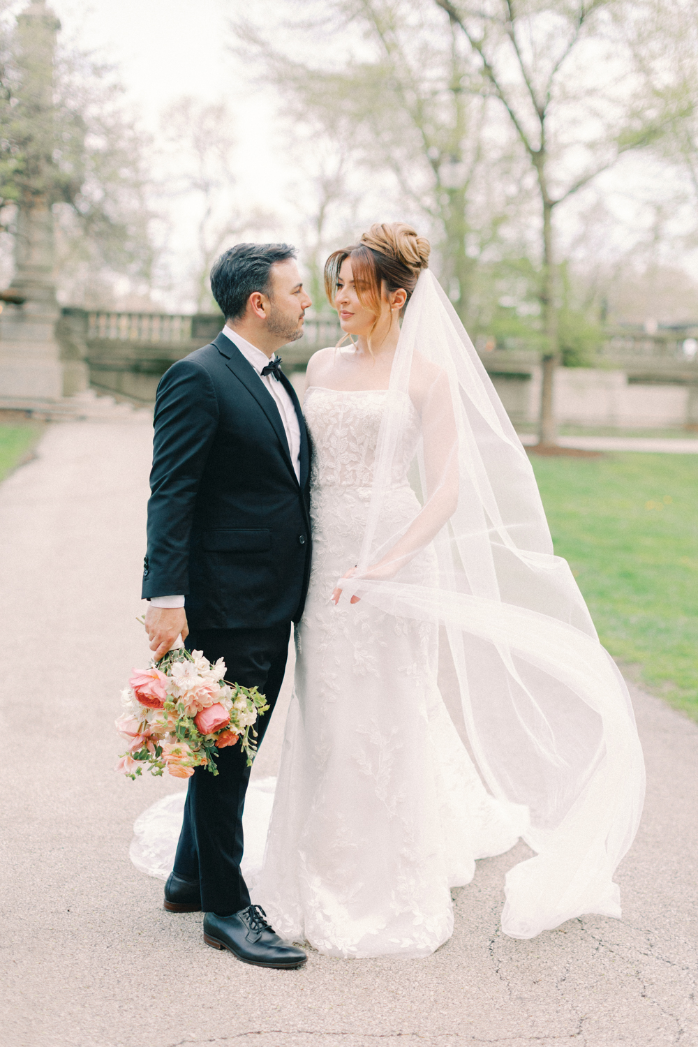 bride and groom in park