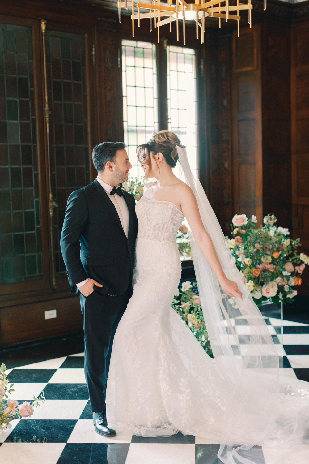bride and groom holding each other