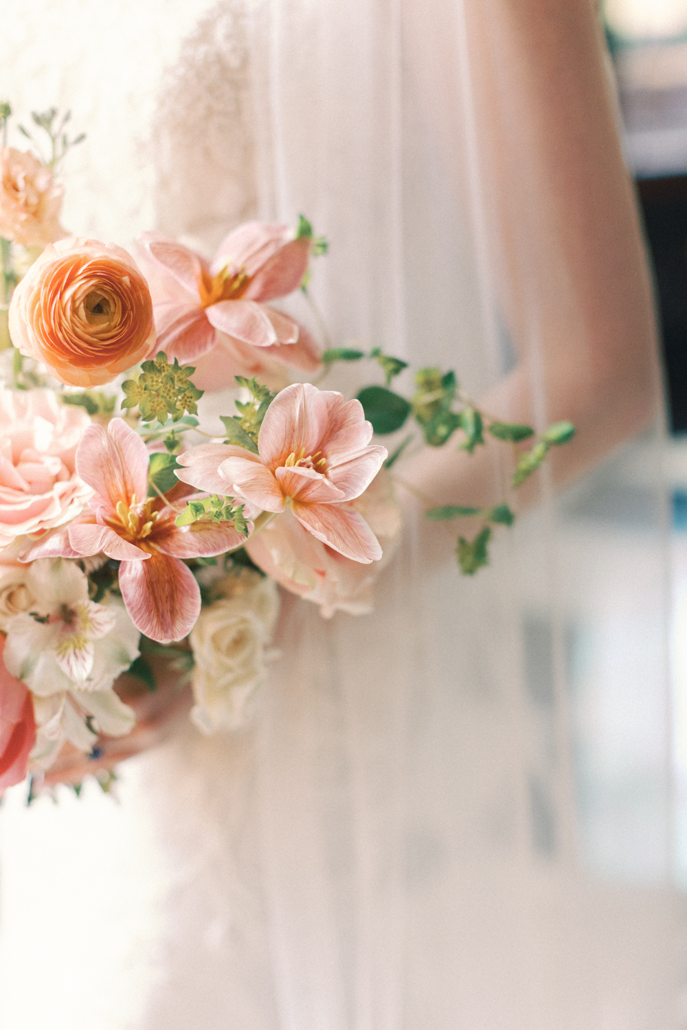 bride holding flowers