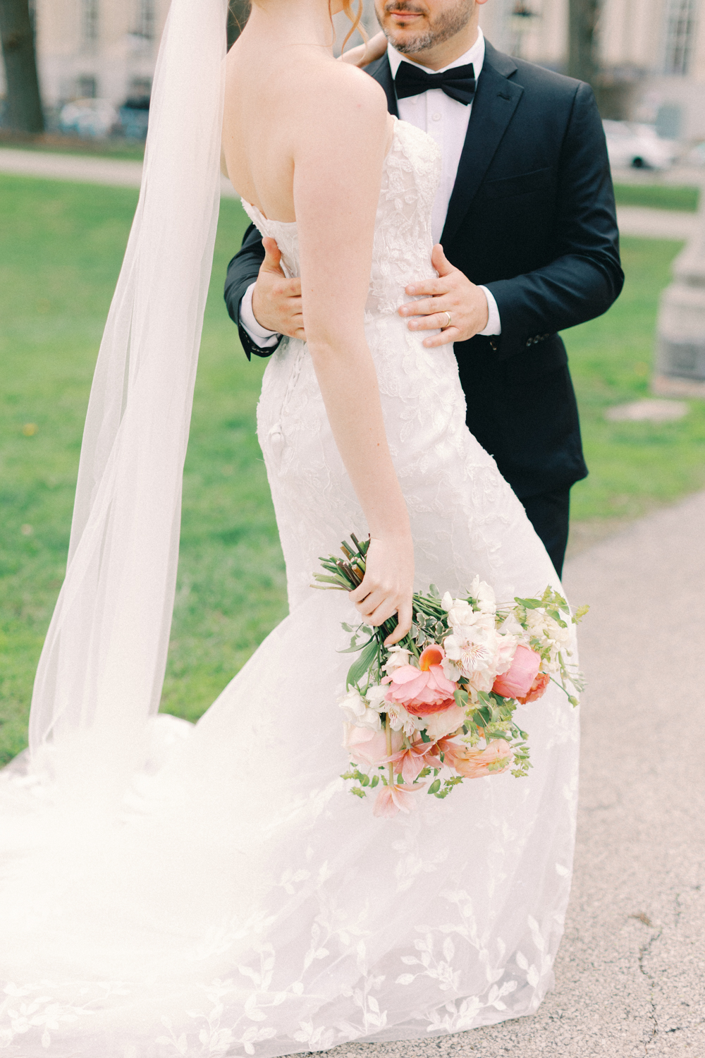 bride and groom hugging