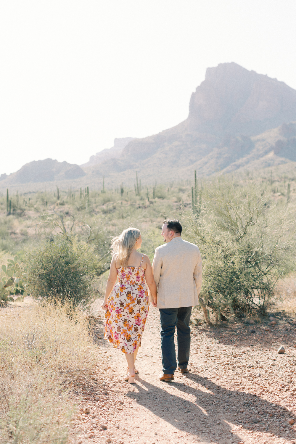 couple walking in desert