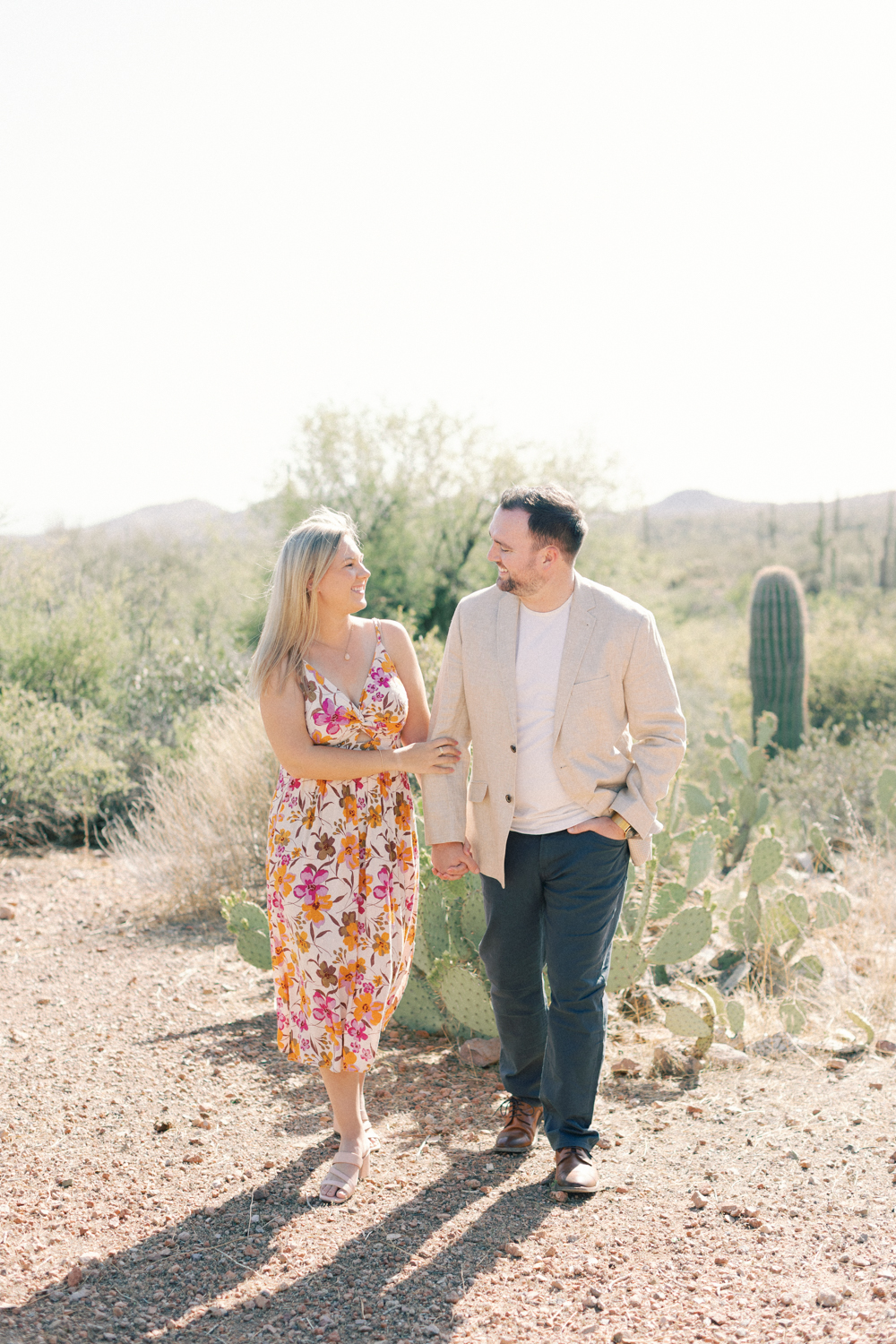 couple walking in desert