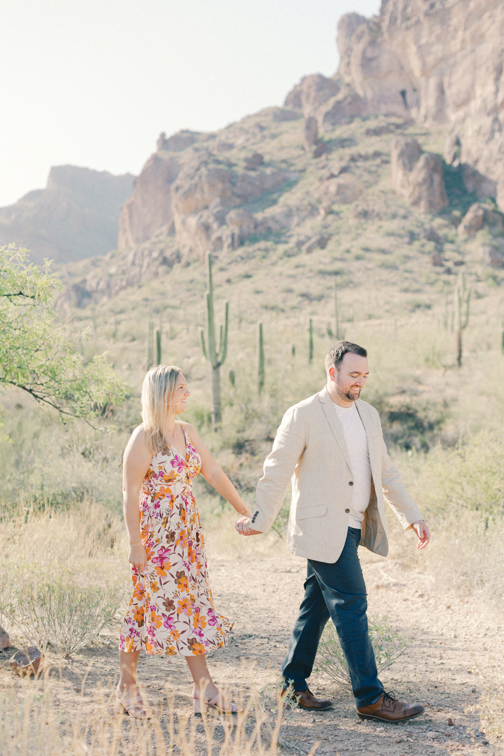 couple walking in desert