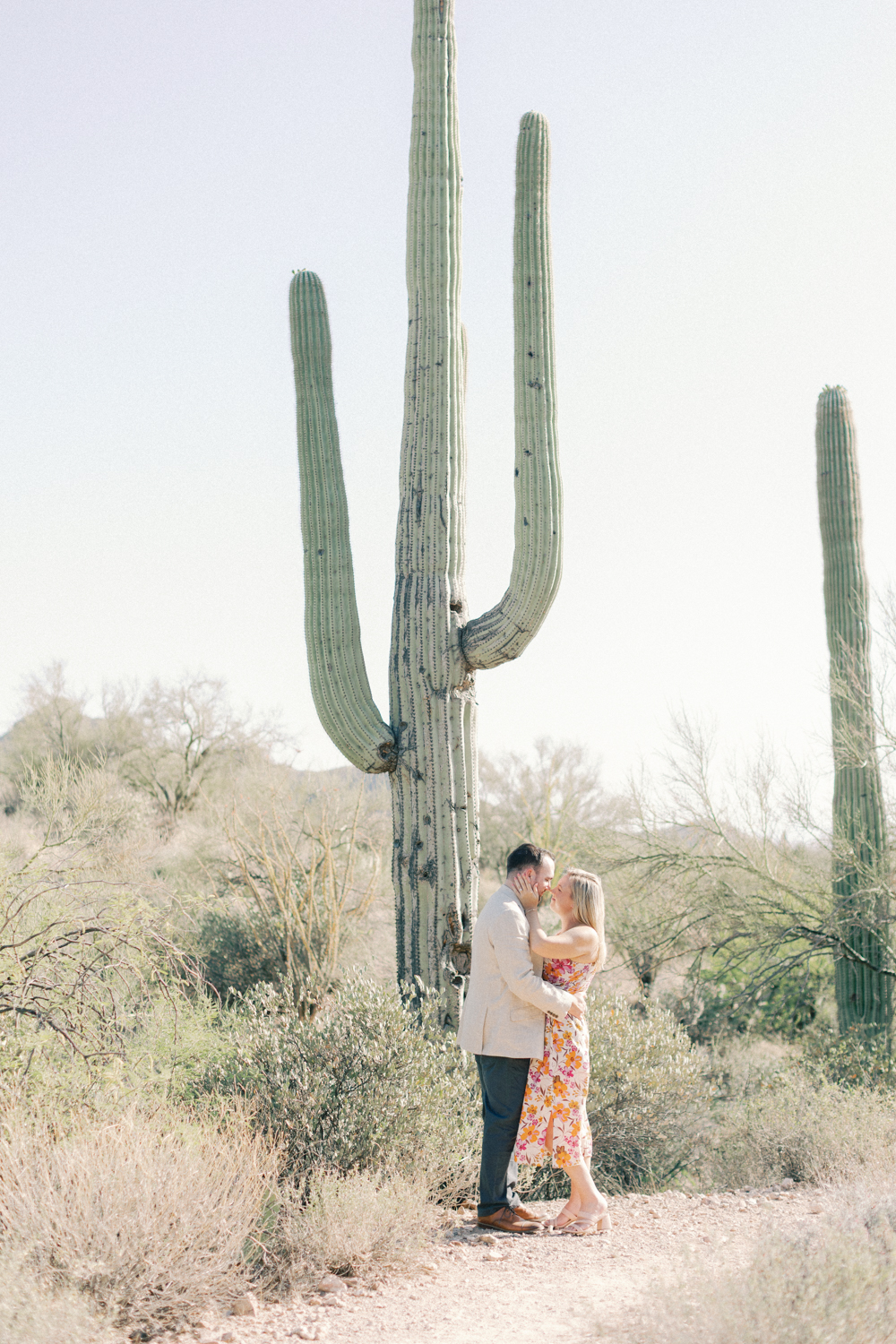 couple in front of cactus