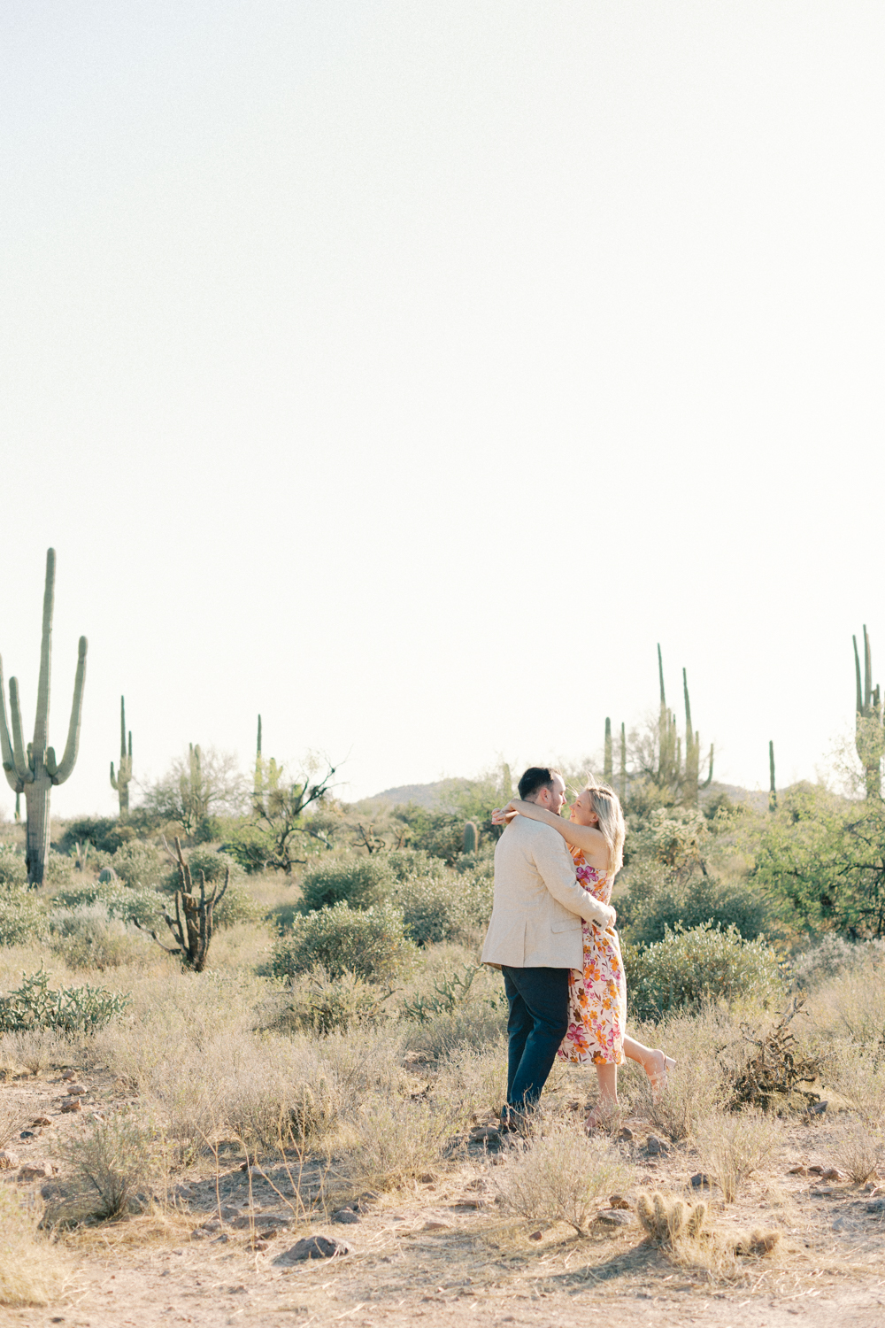 couple in the desert of cacti