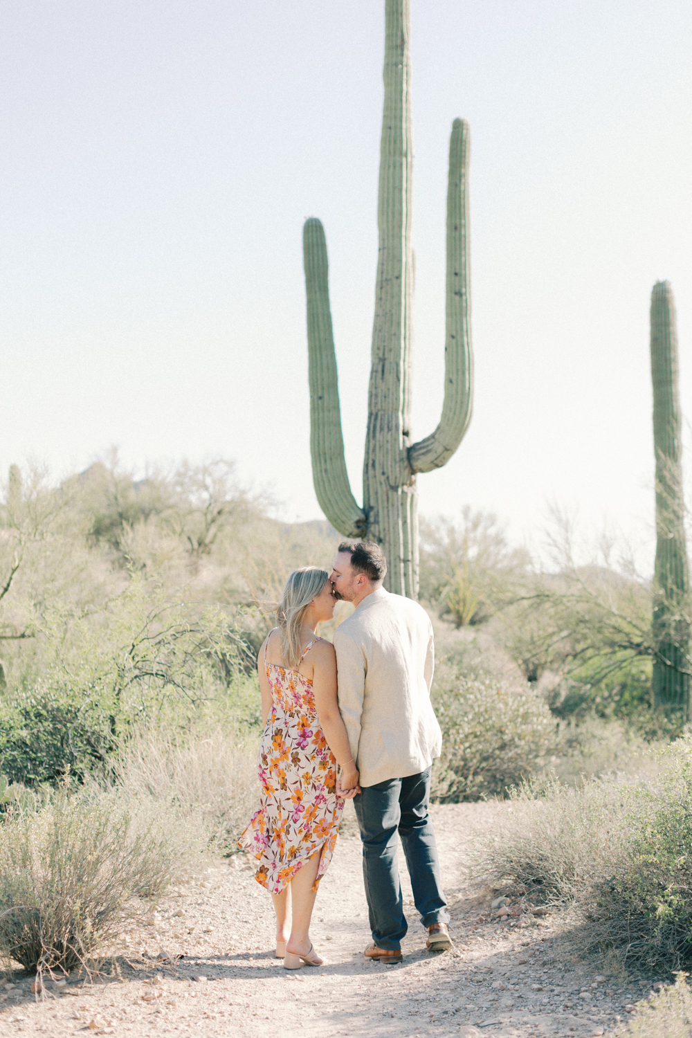 couple in front of cactus