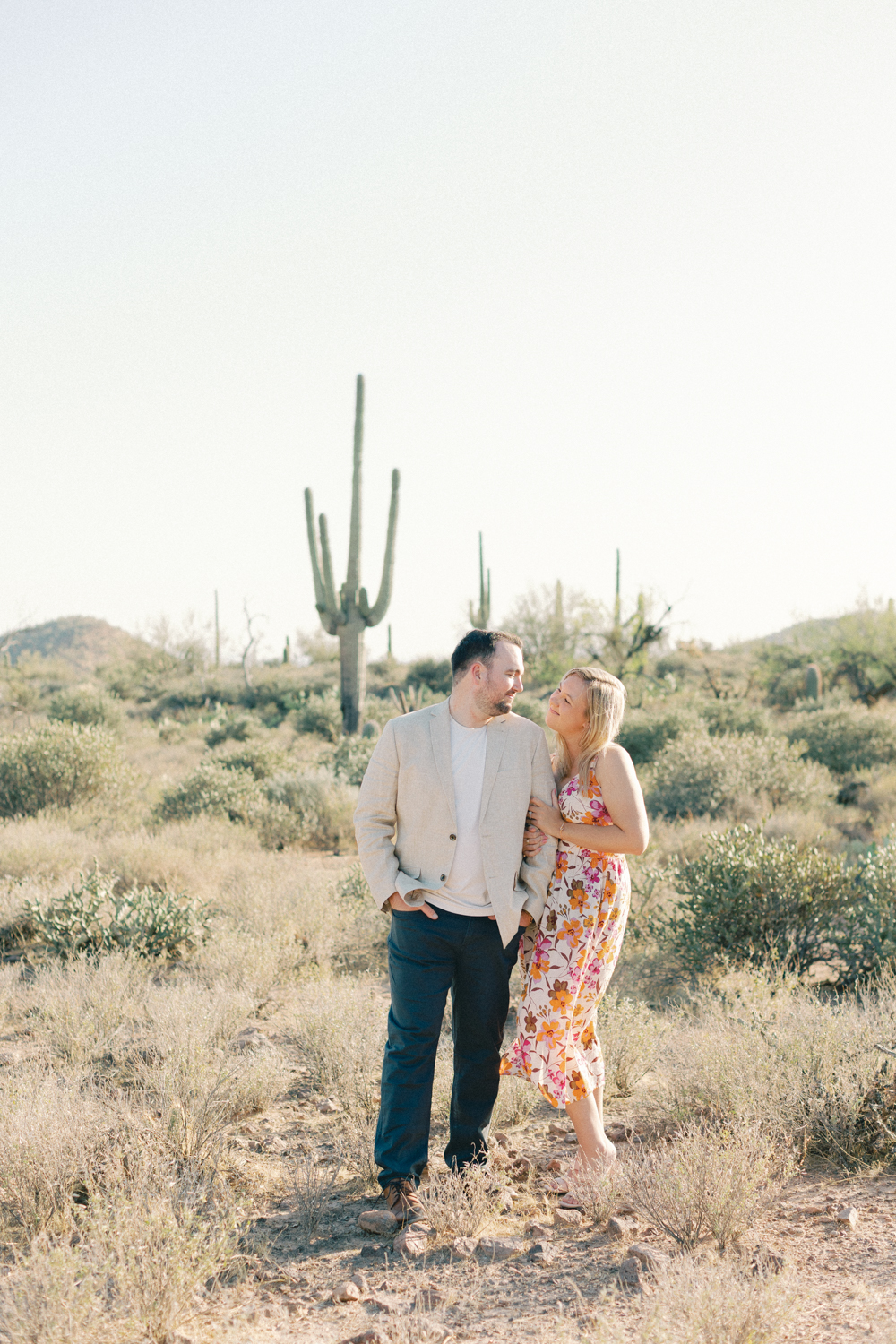 couple posing side by side