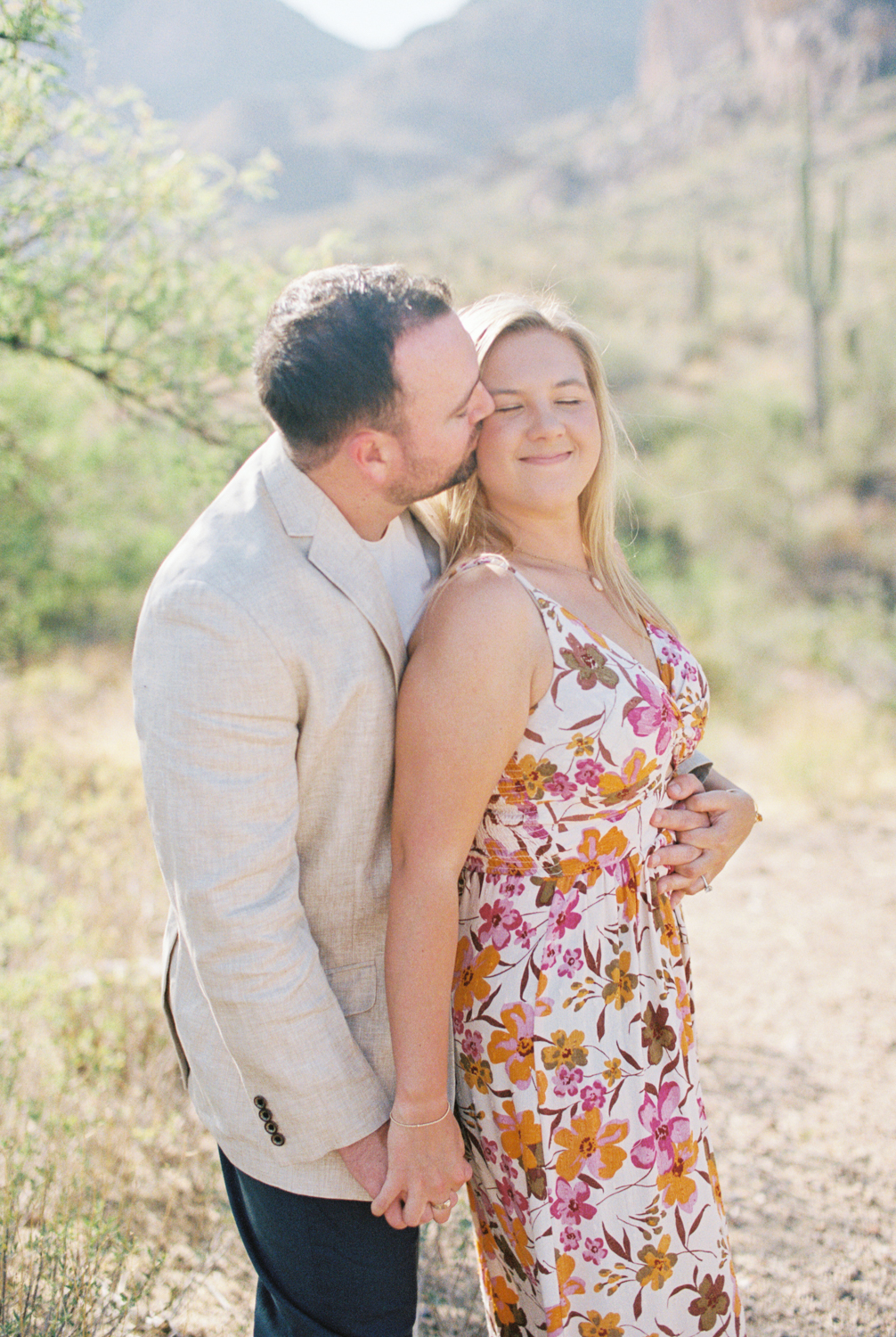 couple snuggled and smiling