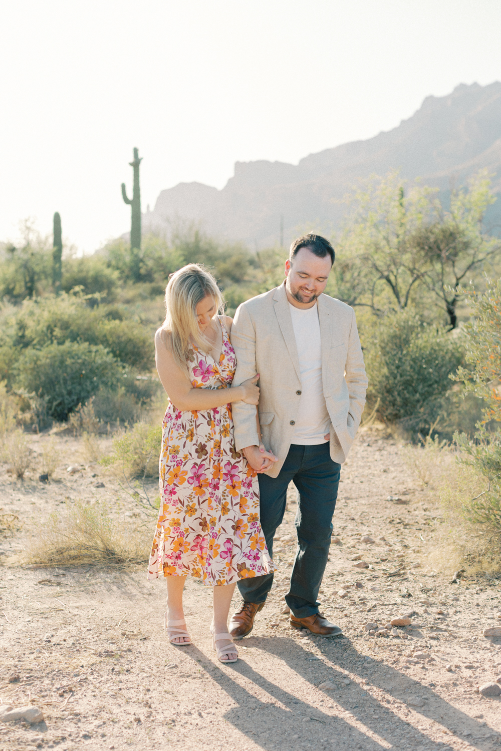 couple walking in desert