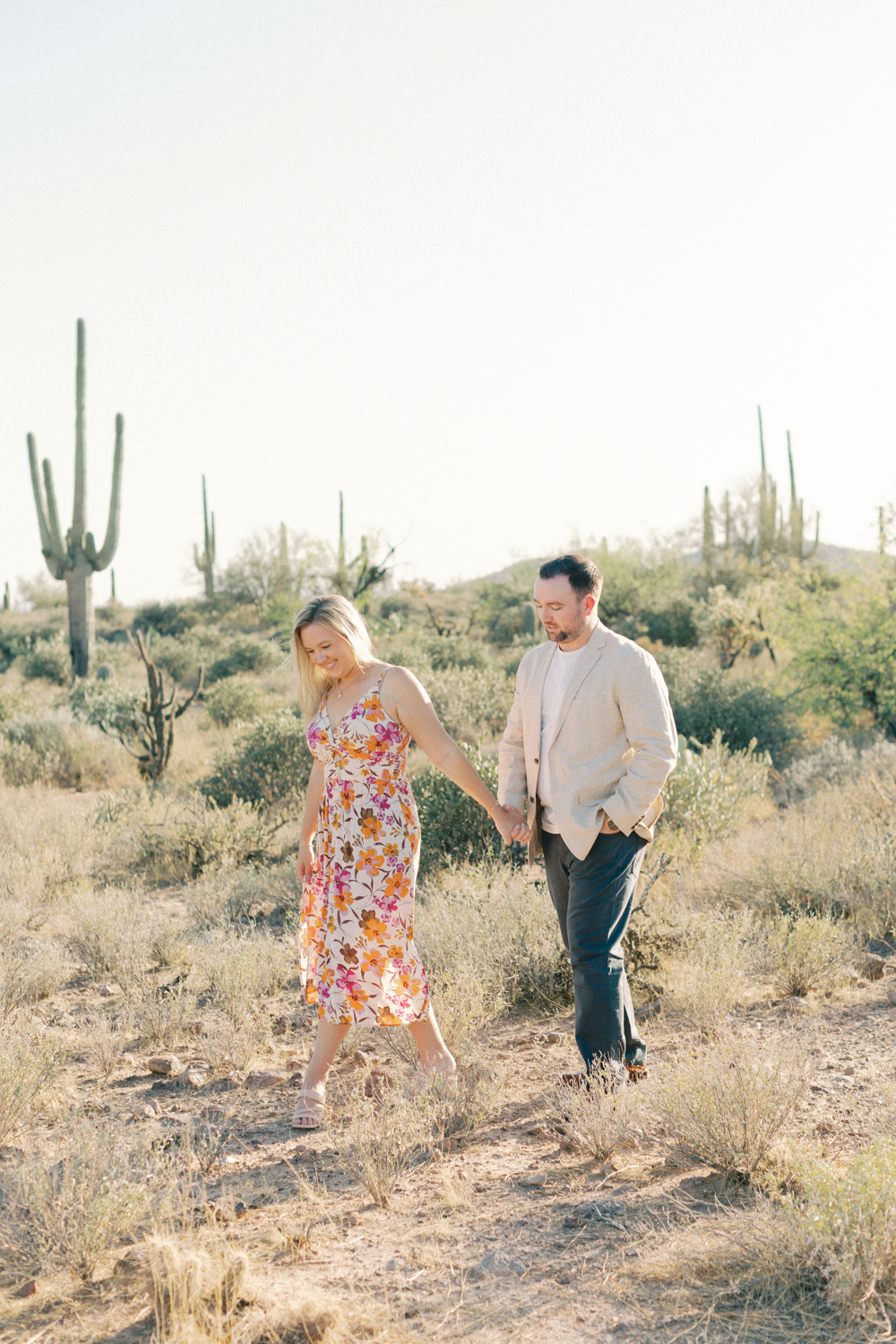 couple walking in desert