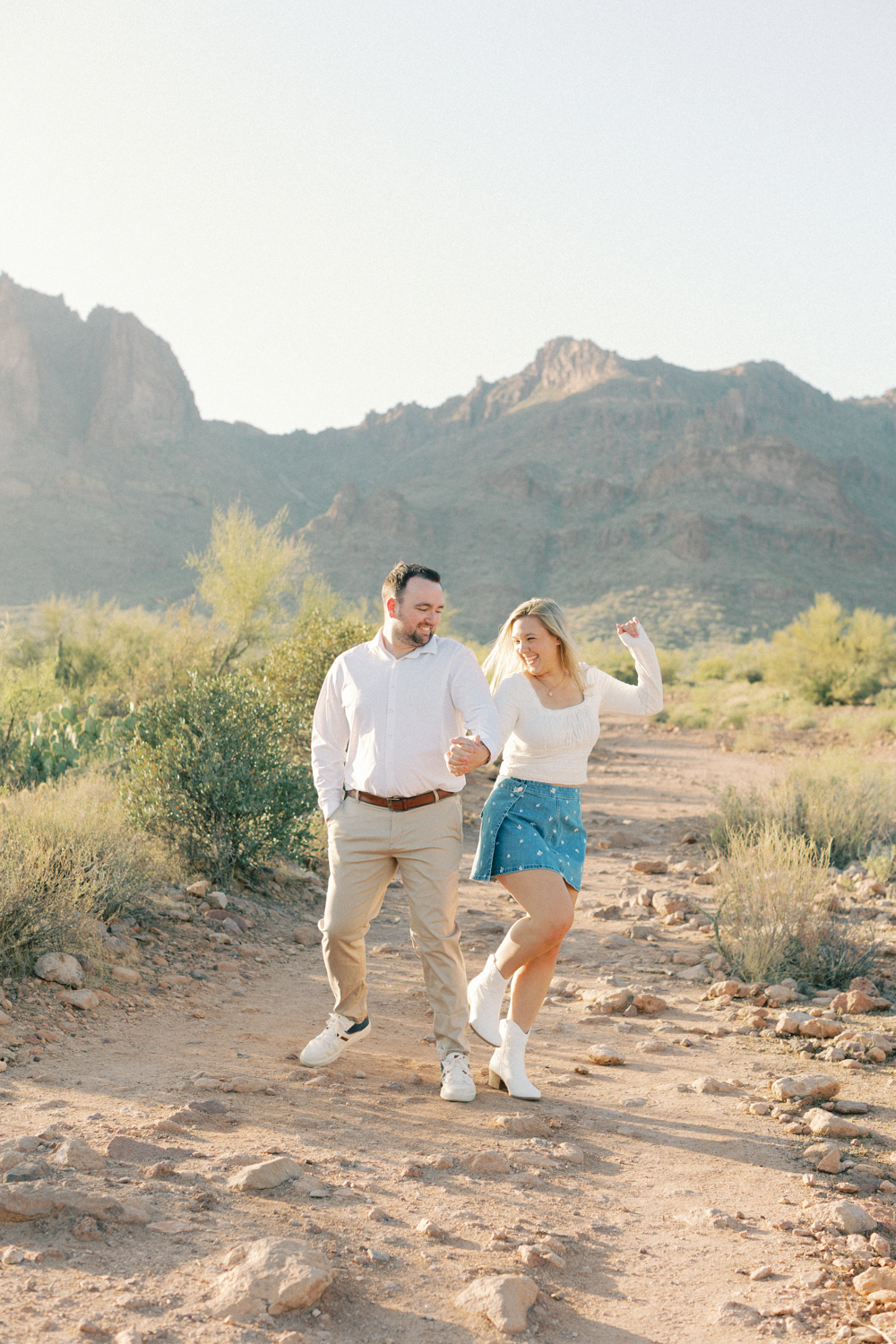 couple walking in desert