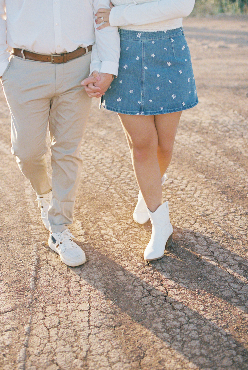 couples shoes in desert 