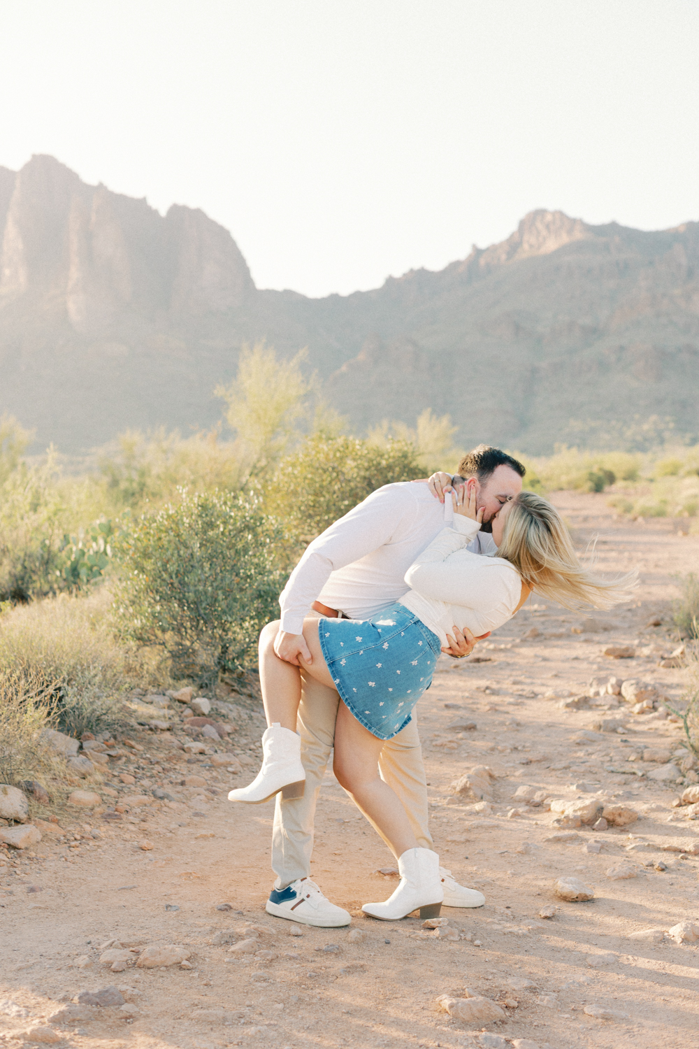couple dipping in desert