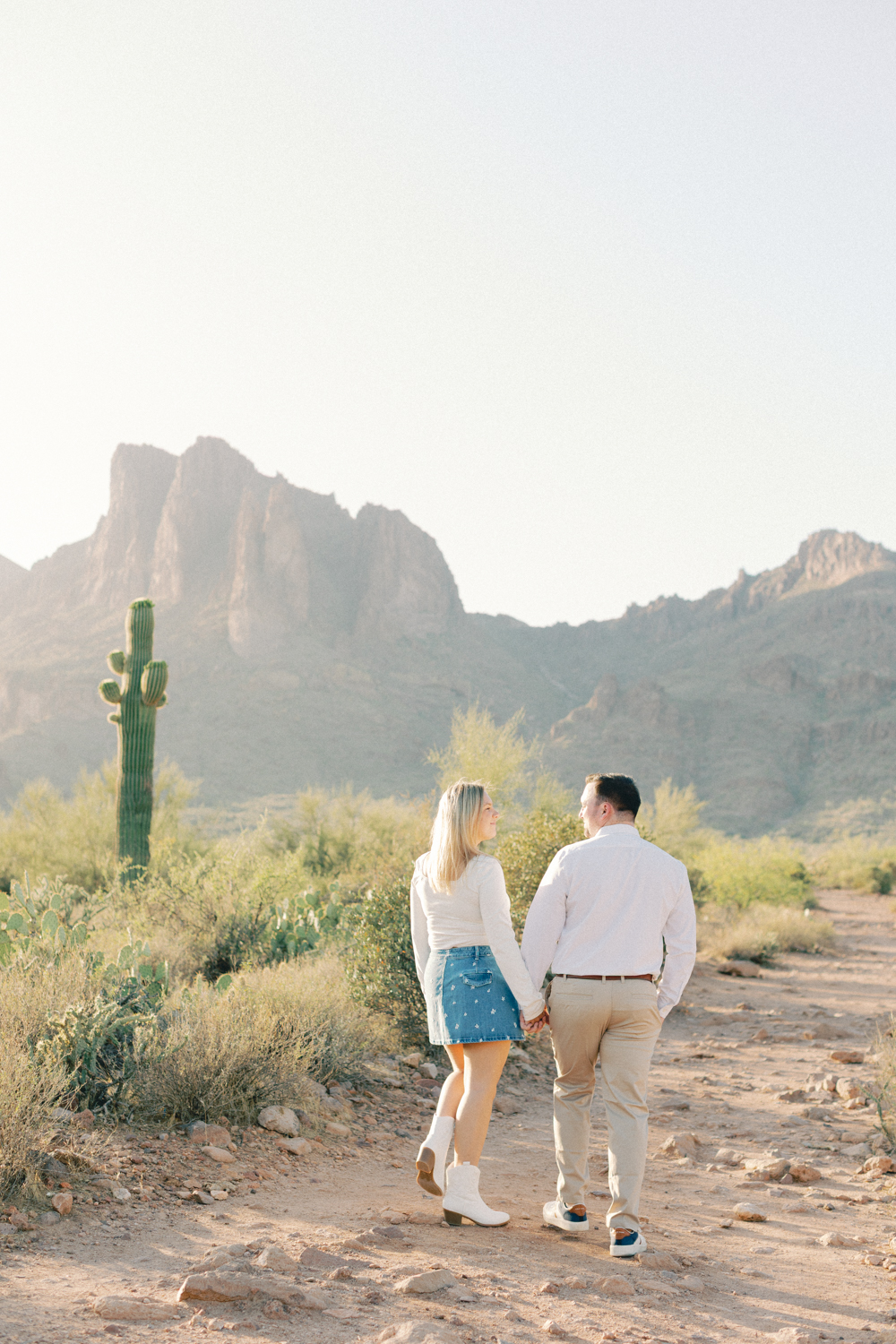 couple walking in desert