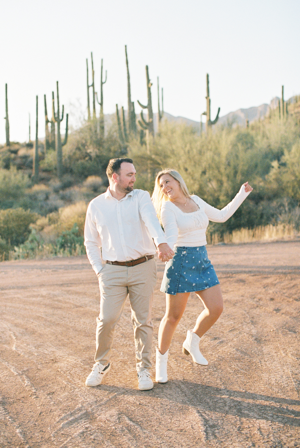 couple walking in desert