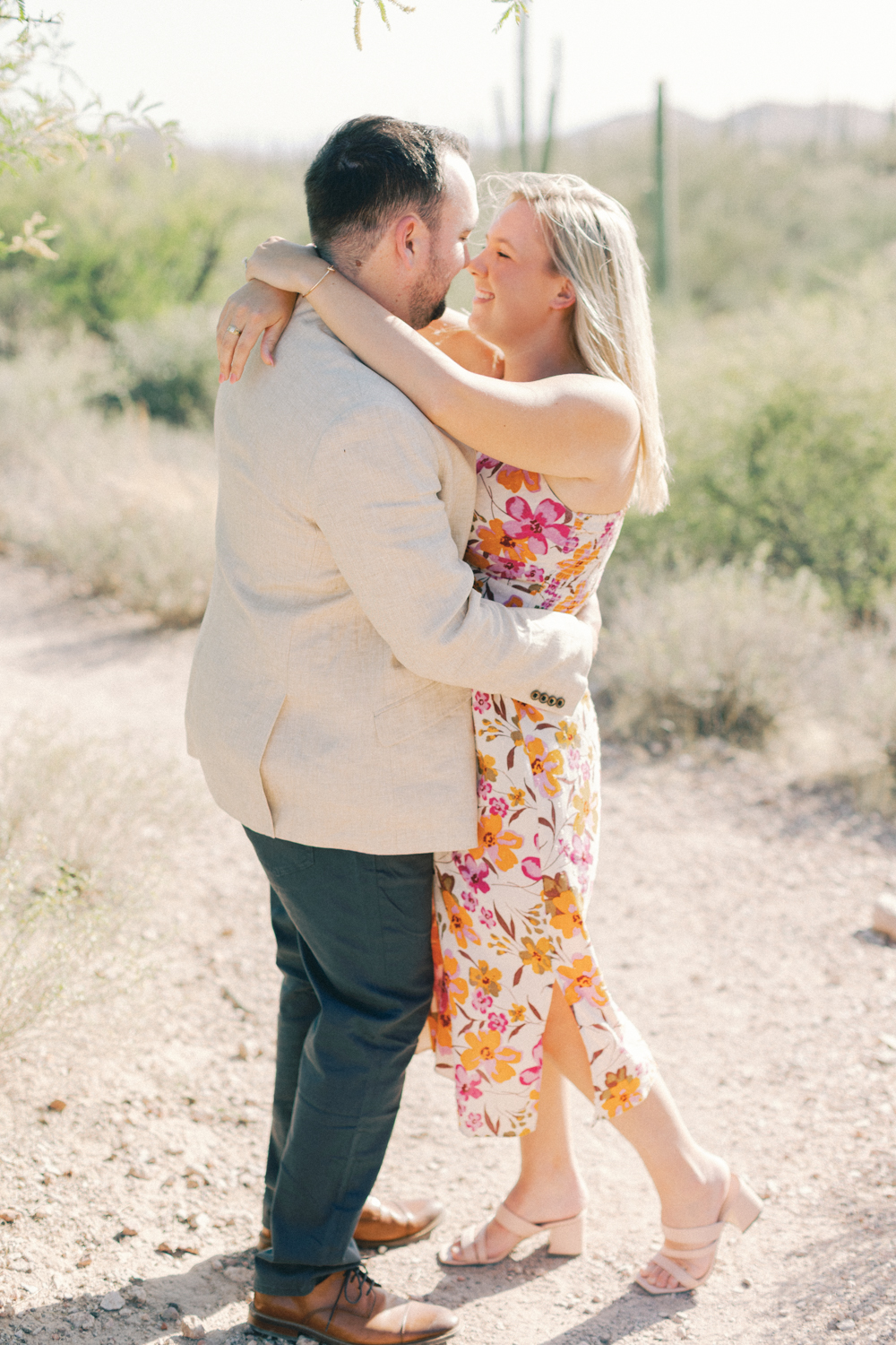 couple dancing in desert