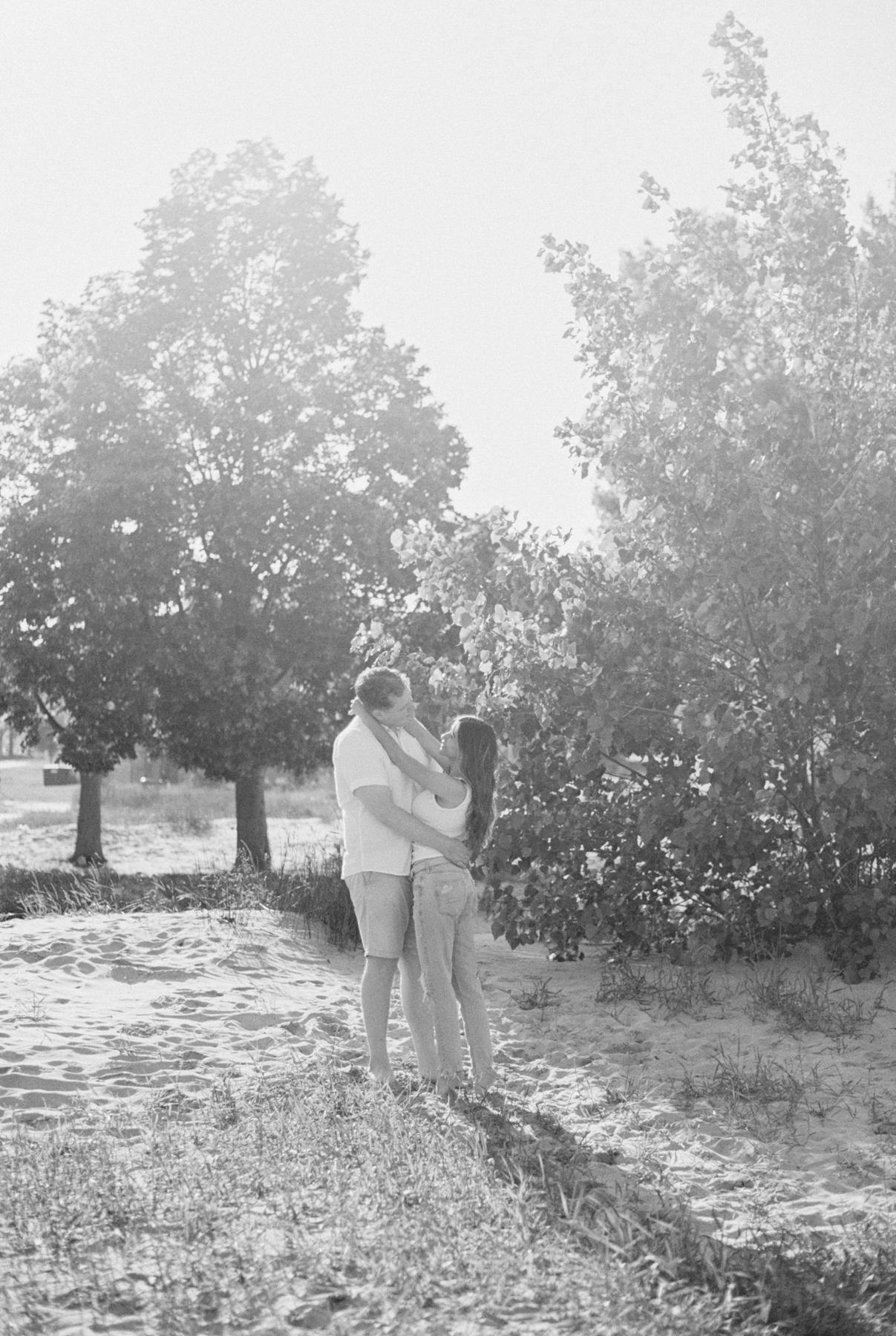 couple holding each other at beach