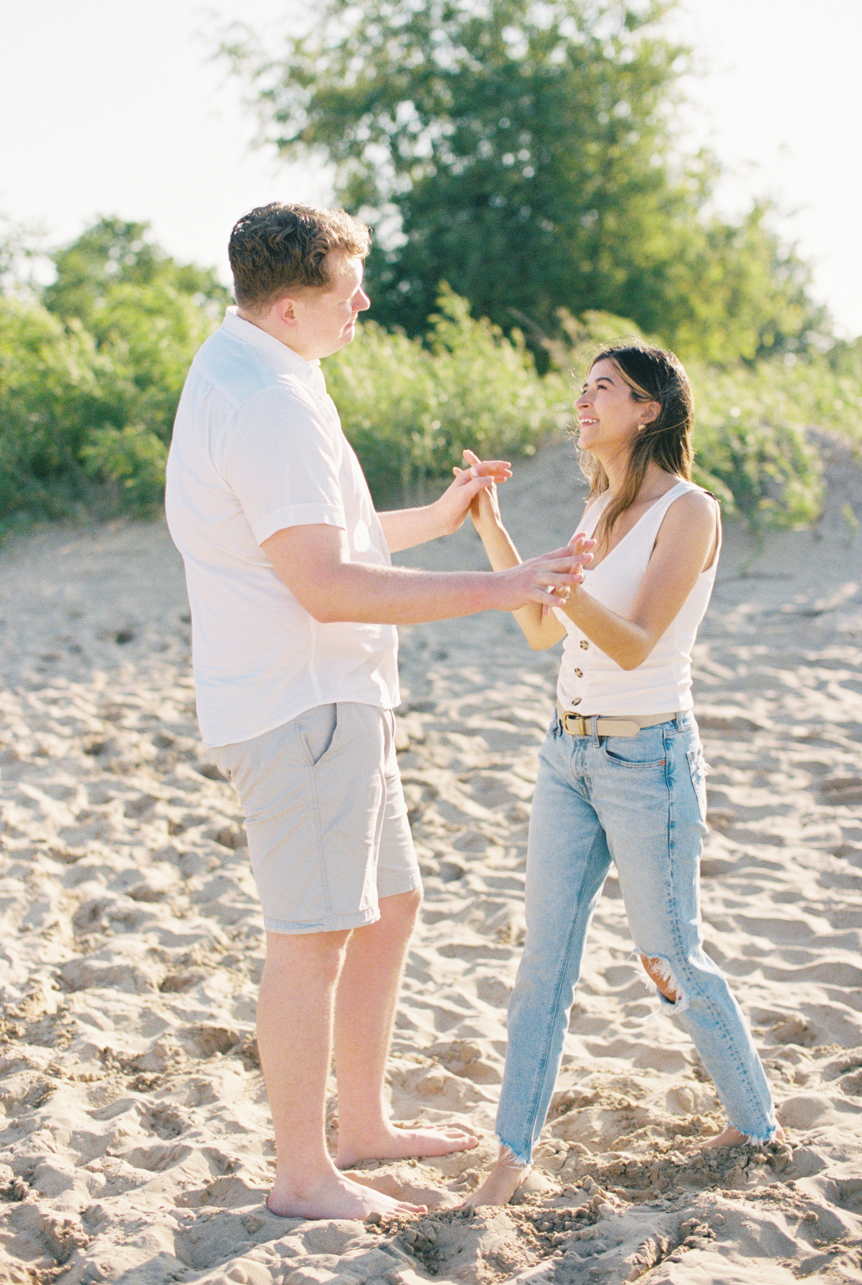 couple spinning at beach
