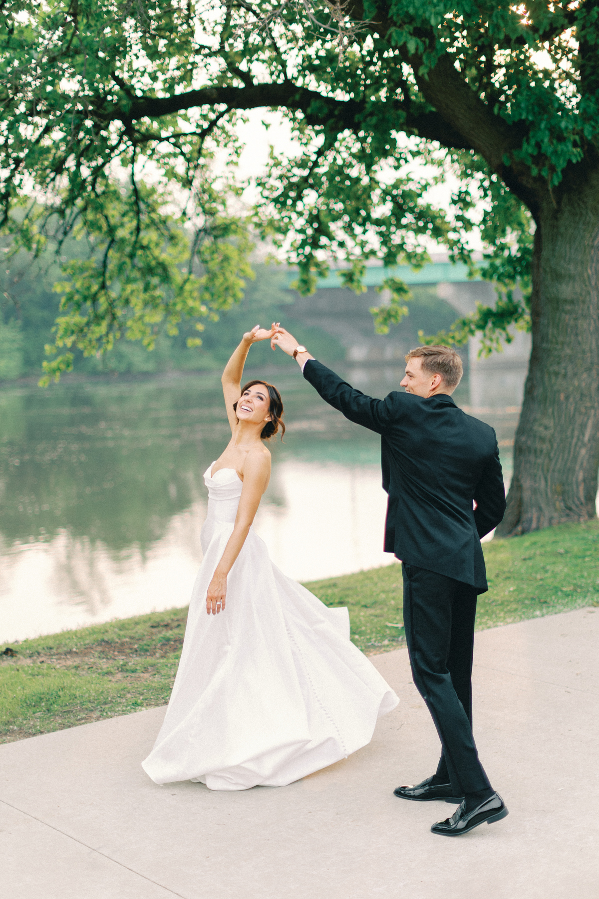 bride and groom twirling