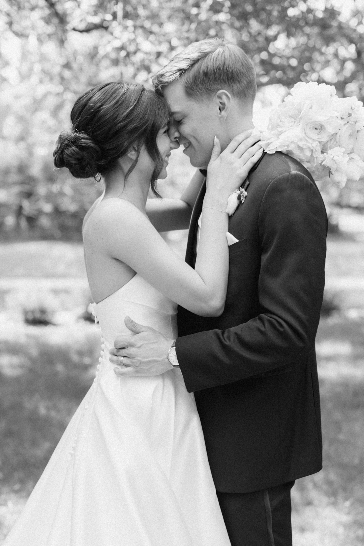 bride and groom nuzzling