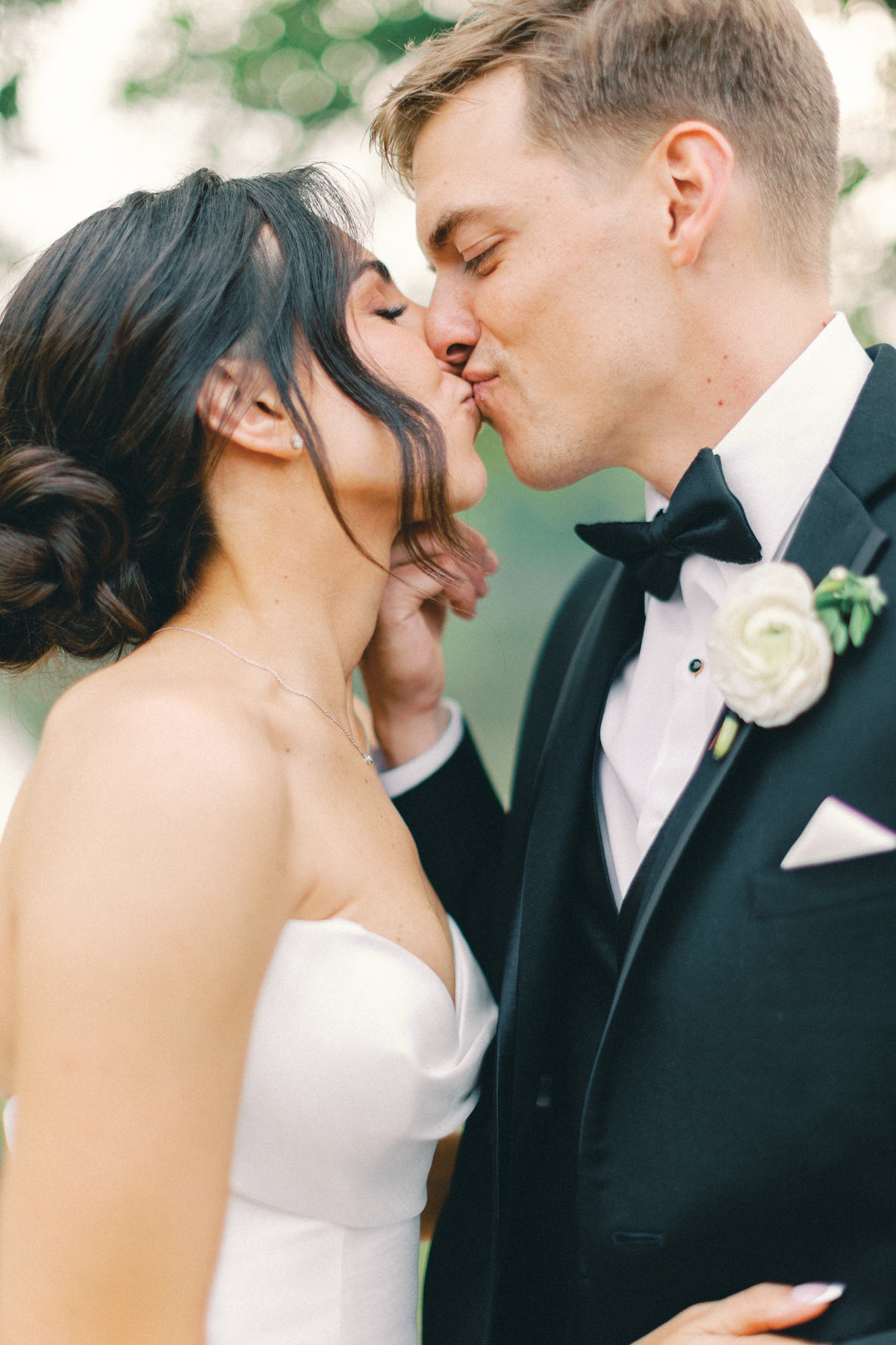 bride and groom kissing