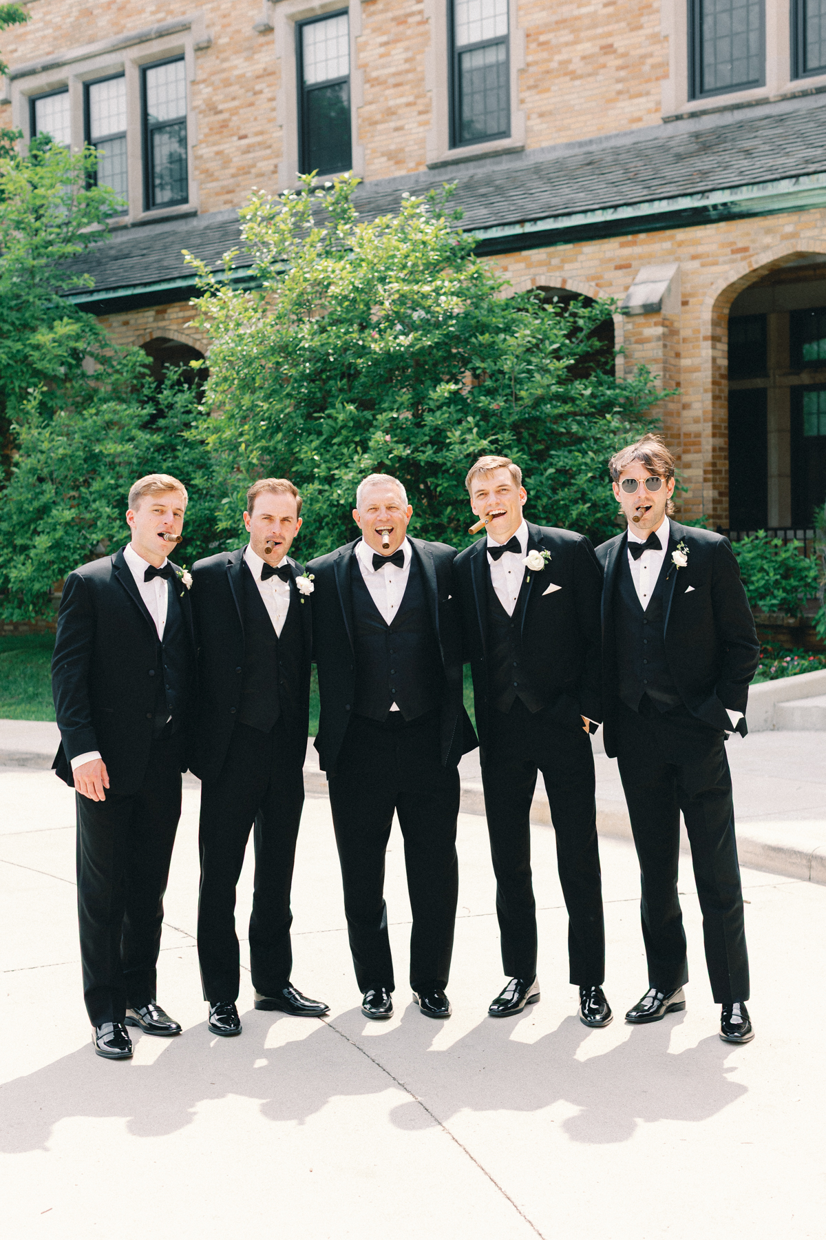 groomsmen with cigars
