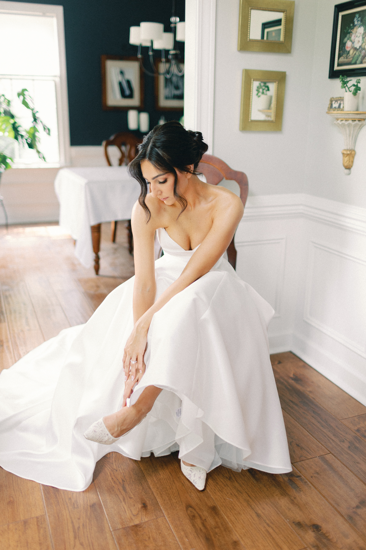 bride putting on shoes