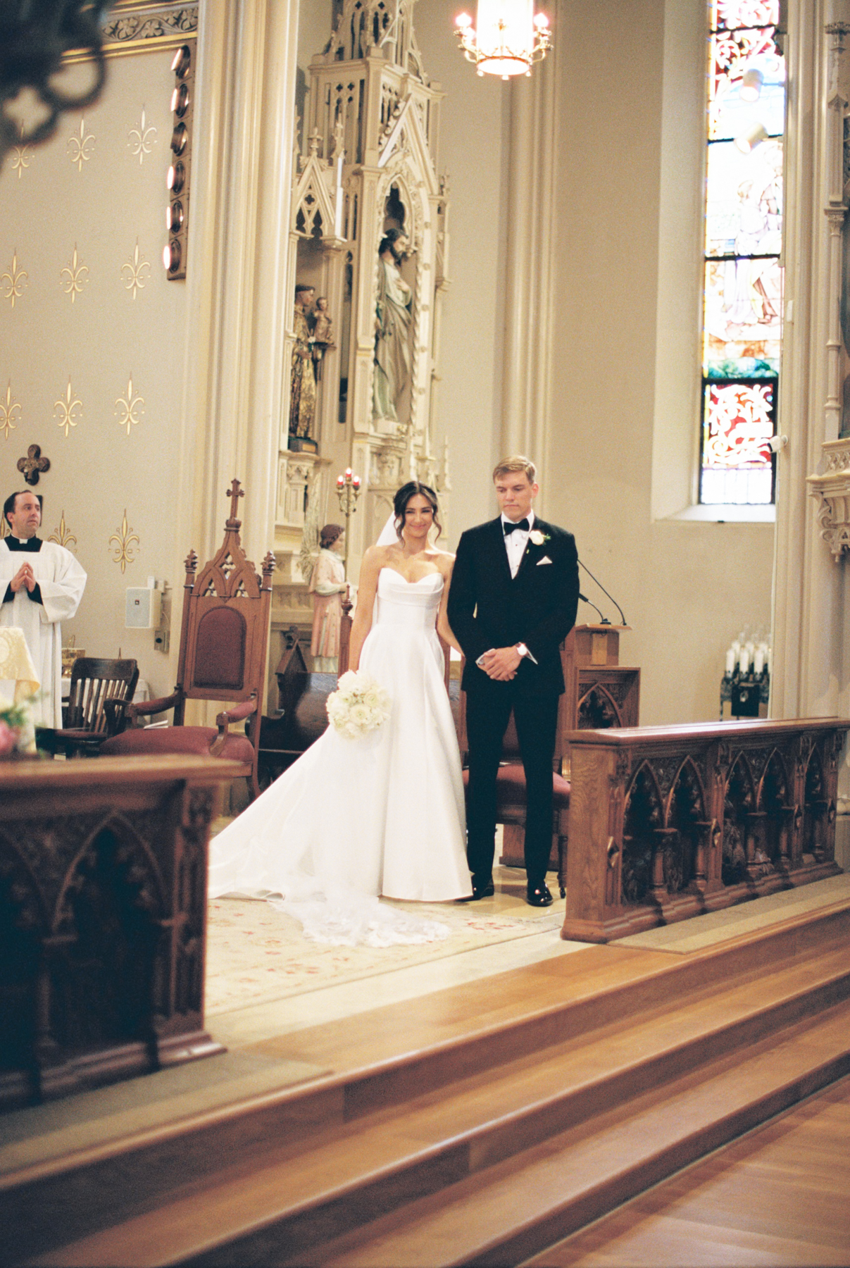 bride and groom at altar