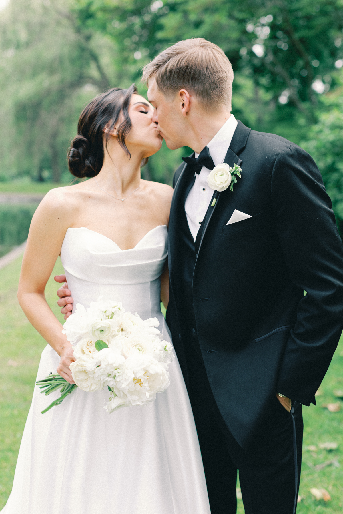 bride and groom kissing