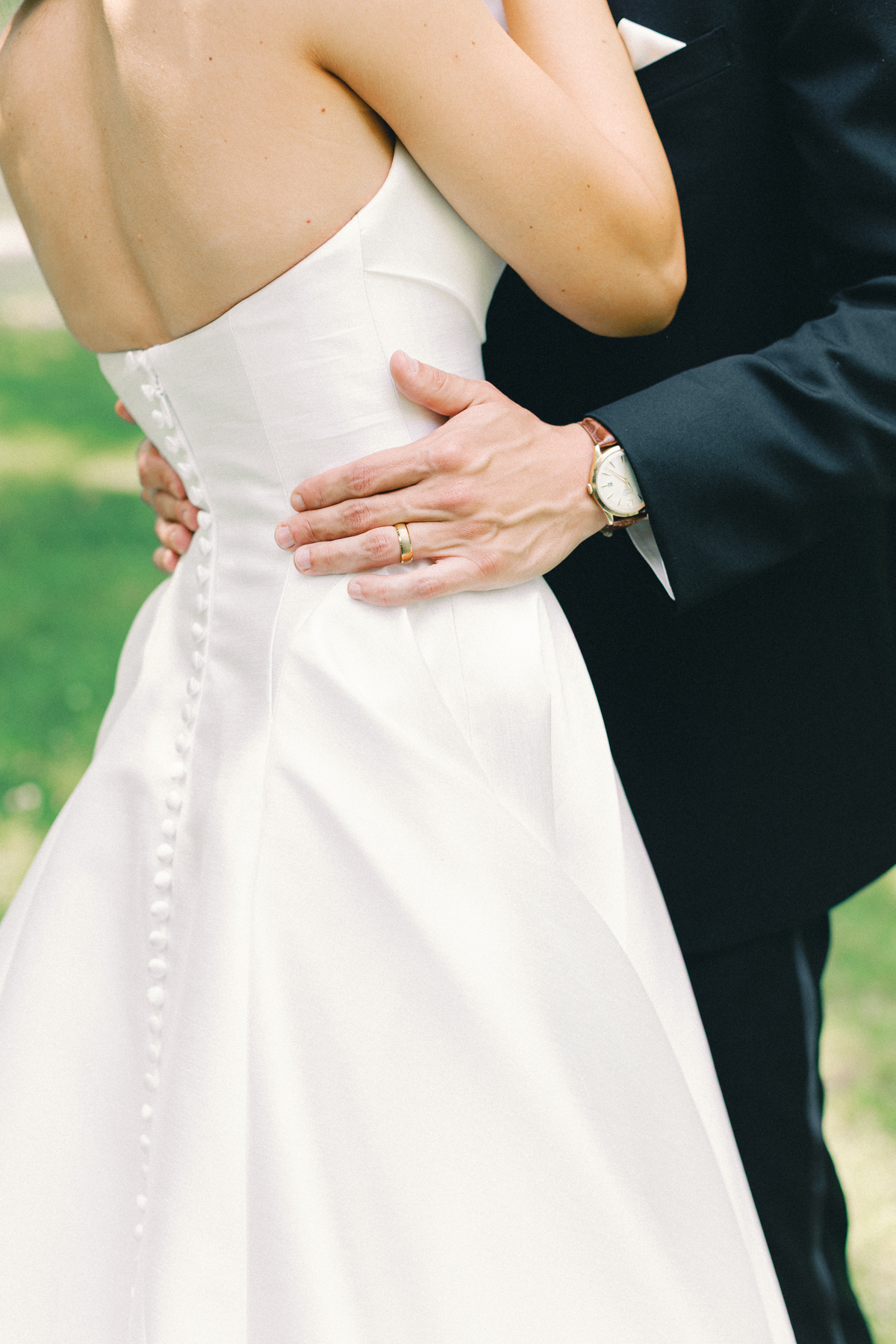 bride and groom hand details