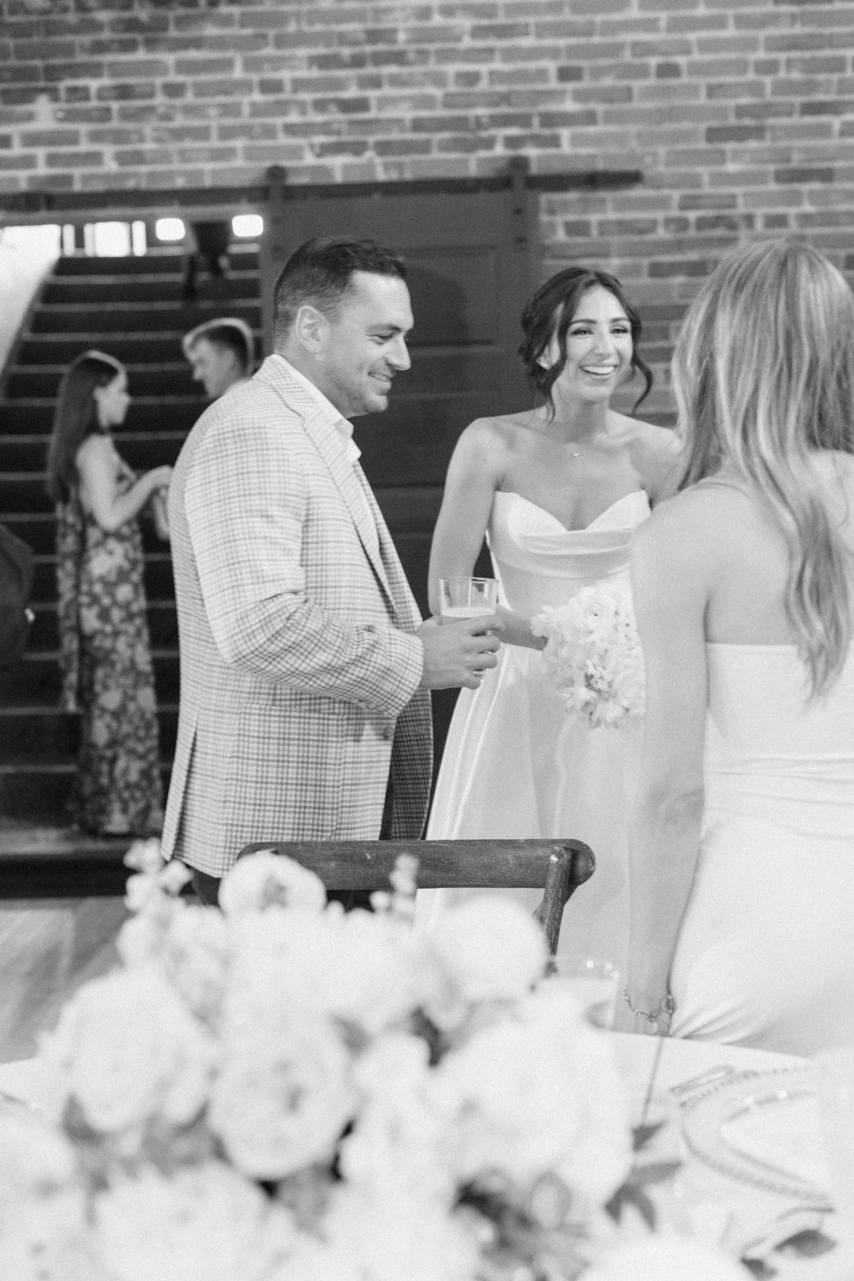 bride at cocktail hour with guests