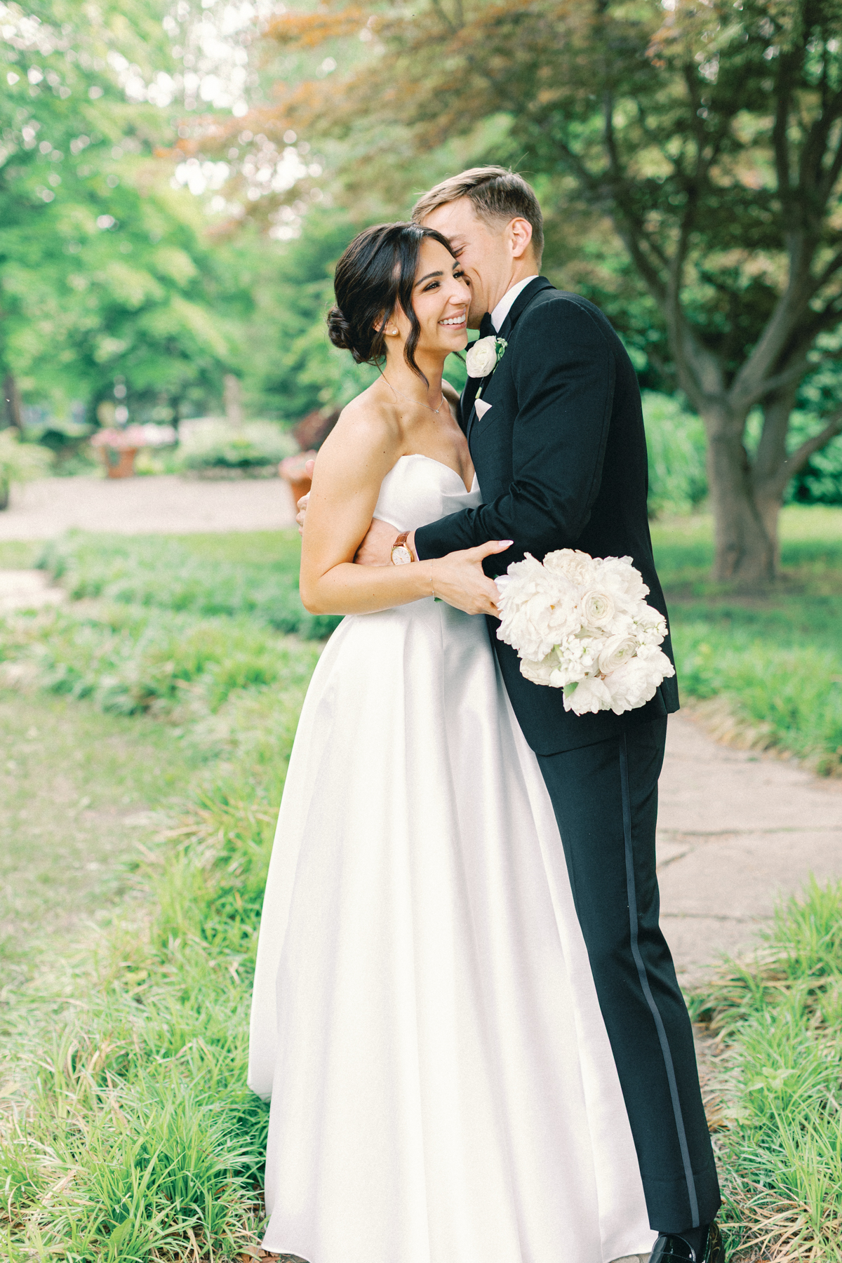 bride and groom laughing
