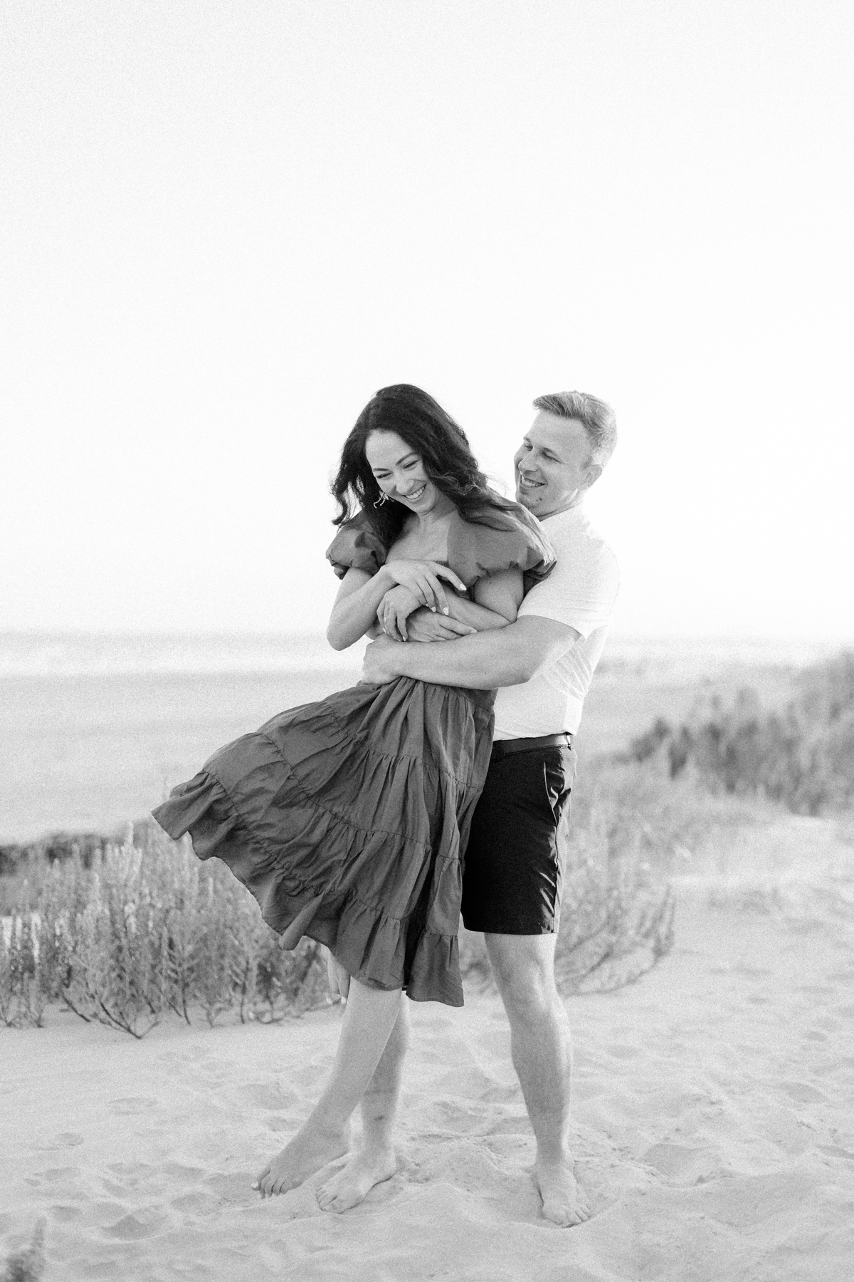 couple laughing at beach